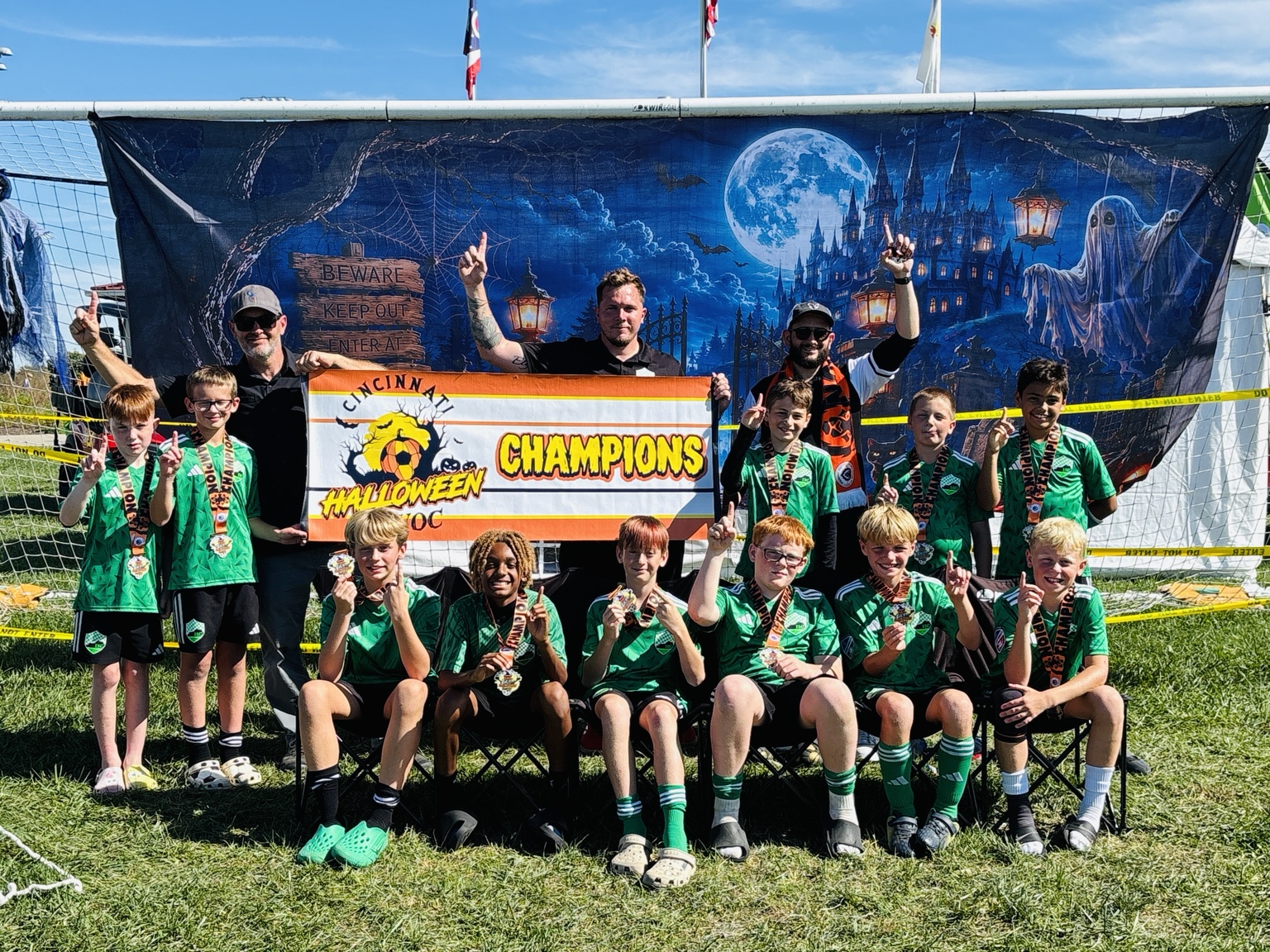 Titans celebrating their Kings Hammer Halloween Havoc win
